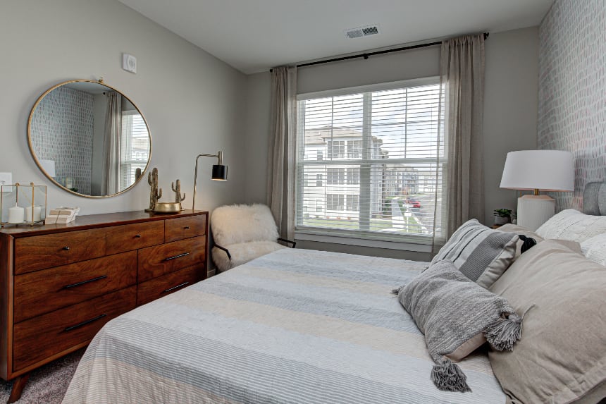 Model bedroom in Bloomington apartment